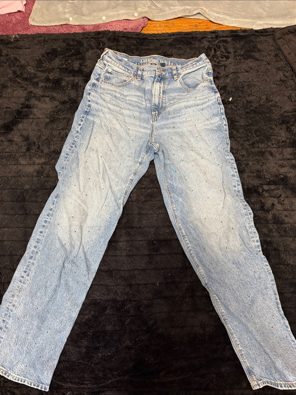 High-Rise Light Blue Women's Jeans with Subtle Speckle Detail